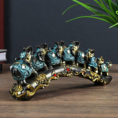 Сувенир полистоун Семь слонов в синей попоне с кистями и зеркалами на бивне 10х5,5х28 см